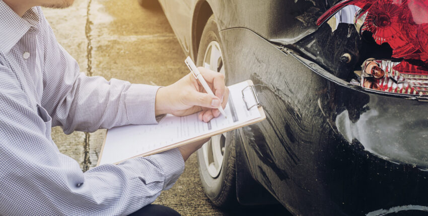 Expert mechanic checking for car's emissions